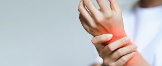 woman-has-pain-her-wrist-health-care-concept-min